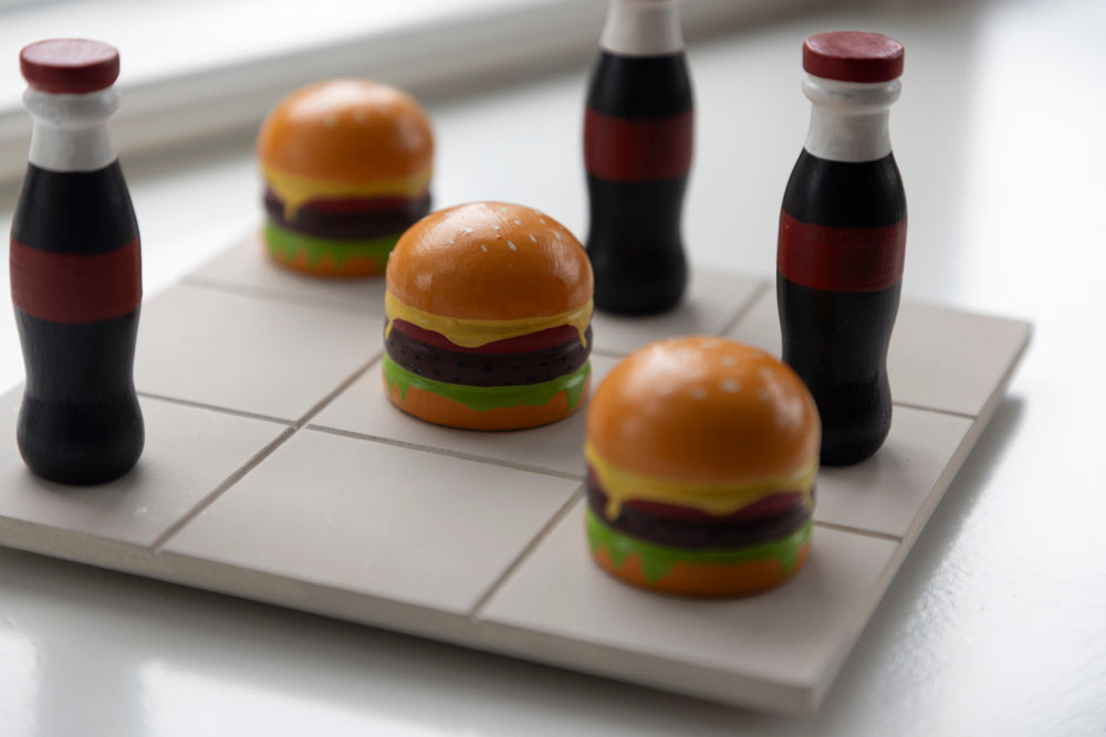 Tre i rad Cola & Burgare 19x19cm